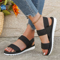 Sandales plates à lacets noires pour femme